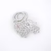 Aretes mano de fátima plata 925 acostados