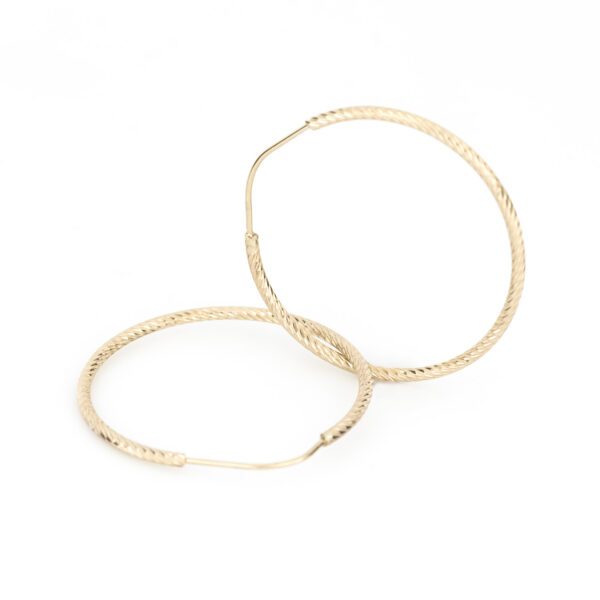 arracada espiral oro 10k