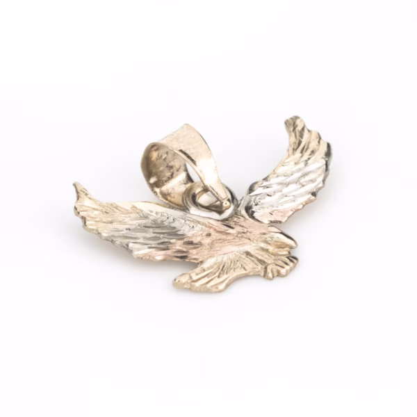 dije águila oro 10k Clic oro