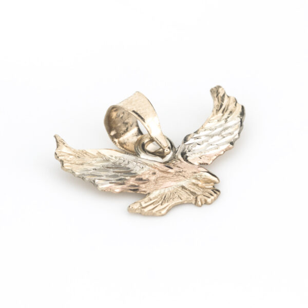dije águila oro 10k Clic oro